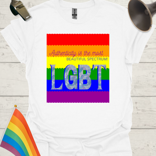 White t-shirt with rainbow flag design and text on a wooden surface