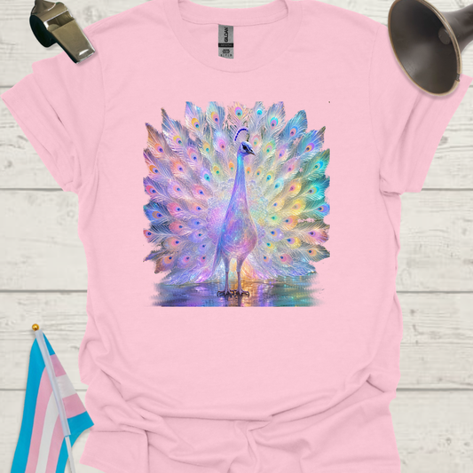 Pink t-shirt with a colorful peacock design on a wooden surface.