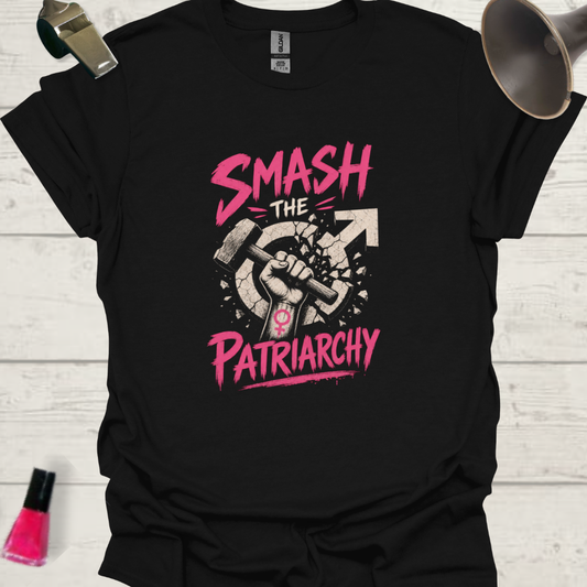 Black t-shirt with 'Smash the Patriarchy' graphic design on a wooden surface.